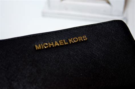 portfel michael kors podróbka|Michael Kors leather bag.